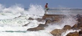 Thumbnail Man watches Hurricane Irene waves