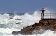 Thumbnail Man watches Hurricane Irene waves