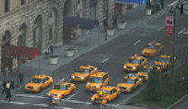 Thumbnail Group of yellow taxi cabs at NYC intersection