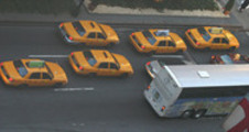 Thumbnail Taxi cabs and a bus in New York City